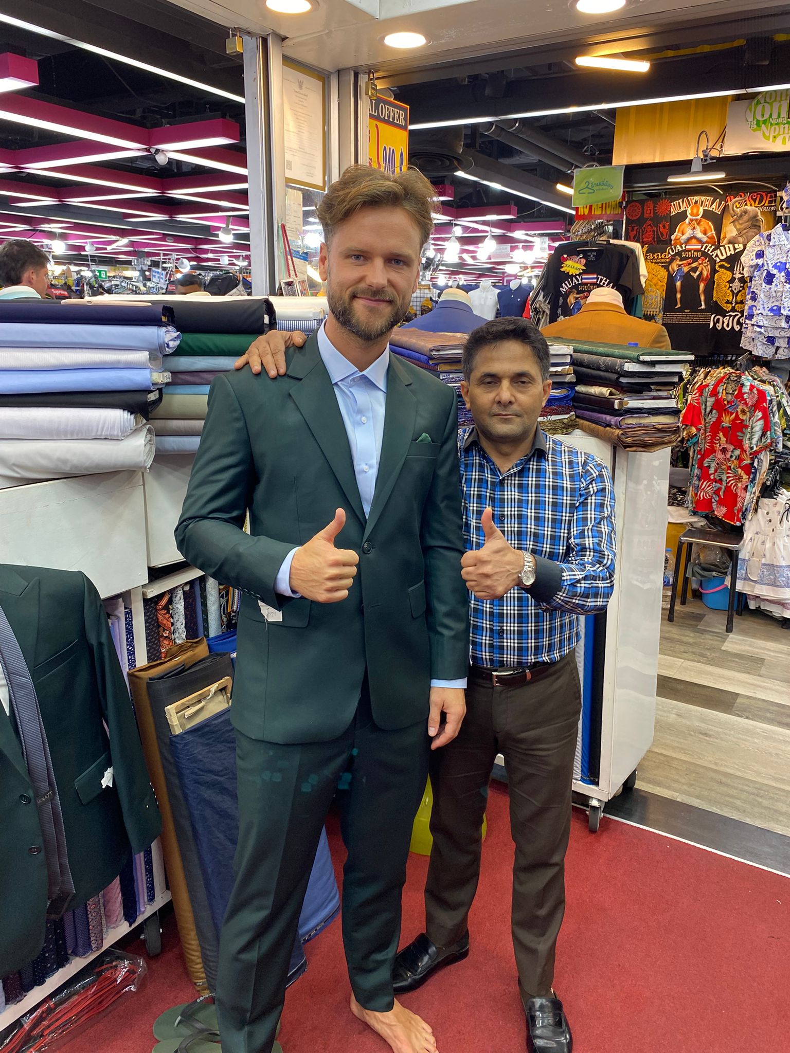Happy client in custom tailored suit at King Fashion Uni Bangkok